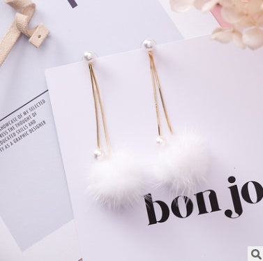 Autumn and winter new wild color mane pearl snake bone chain hair ball earrings simple tassel long earrings female