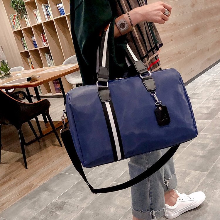 Travelling bag female hand bag large capacity luggage male go on a business trip travel go out pack clothes bag