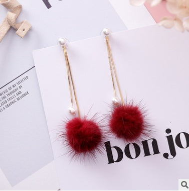 Autumn and winter new wild color mane pearl snake bone chain hair ball earrings simple tassel long earrings female