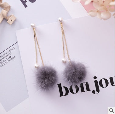 Autumn and winter new wild color mane pearl snake bone chain hair ball earrings simple tassel long earrings female